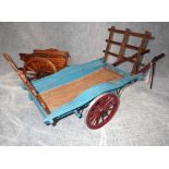 A SCRATCH BUILT MODEL HAY WAIN of traditional form, in blue, inscribed "CL SMITH EYNSHAM" and a cart