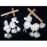 PELHAM PUPPETS; TWO "POODLES" with white fur, wooden bodies and metal feet, both shedding a bit,