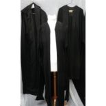 SHEPHERD & WOODWARD, OXFORD: A BLACK GRADUATION ROBE and a collection of similar robes