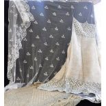 A LINEN APRON, a metallic-work shawl and a lacework veil (3)