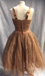 A COFFEE COLOURED TULLE PARTY DRESS, the rouched body decorated with satin bows and shoulder straps, - Image 2 of 2