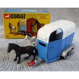 CORGI TOYS; A RICE'S BEAUFORT DOUBLE HORSE BOX (112) with two horses and original box