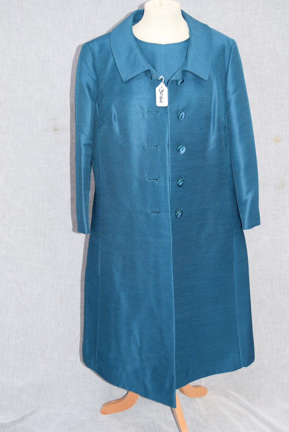 PETIT FRANCAIS; A LADIES VINTAGE 'TEAL' COLOURED DRESS, matching 3/4 sleeve coat, circa 1960's