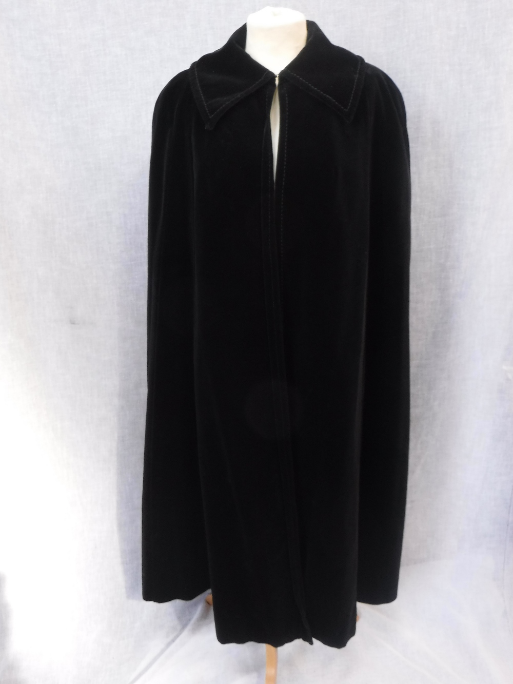 A BLACK VELVET VINTAGE CAPE