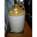 A GLAZED STONEWARE FLAGON, 46 cm high