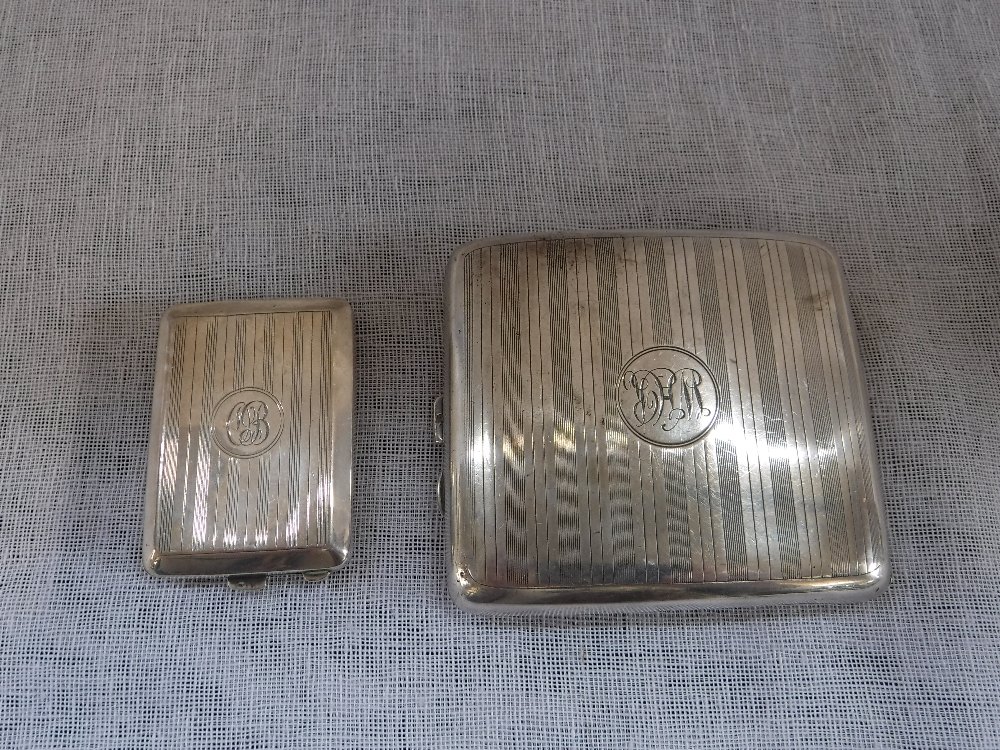 A SILVER CIGARETTE CASE and a Vesta case (c.178gms)