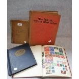 A COLLECTION OF FOUR STAMP ALBUMS