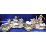 A CONTINENTAL CERAMIC CABARET SET with classical scene decoration and another similar