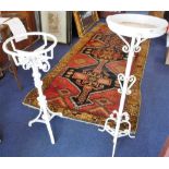 A VICTORIAN WROUGHT IRON PLANT STAND and another similar (2)