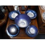 A COLLECTION OF CONTEMPORARY PORTMEIRION BLUE AND SILVER GLASS BOWLS, with matching dishes and