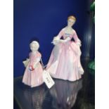 A ROYAL DOULTON FIGURE 'TINKLE BELL' 11cms high and another figure 'Hostess of Williamsburg', 18cm