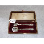 A PAIR OF 19TH CENTURY WHITE METAL HORS D'OEUVRE SERVERS in a fitted presentation case