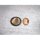 A MICRO-MOSAIC BROOCH of oval form, set in a yellow gilt metal frame, and one other cameo brooch (