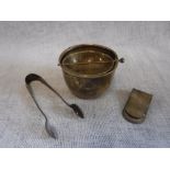 TIFFANY & CO: A SILVER PAPER MONEY HOLDER, a pair of silver tongs, a silver pot with swivel lid (3)