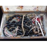 A COLLECTION OF COSTUME JEWELLERY AND BEADS