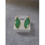 A PAIR OF GREEN STONE DROP EARRINGS set in silver gilt of lozenge form, with fish hook fasteners