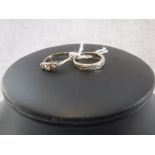 A DIAMOND DRESS RING, set in platinum, on an 18ct yellow gold shank and one other (2)