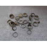 A COLLECTION OF WHITE METAL DRESS RINGS