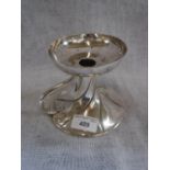 A SILVER CANDLESTICK HOLDER with carrying handle (c.211gms)