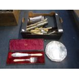 A VICTORIAN SILVER PLATED SALVER and a collection of silver-plated flatware