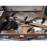A COLLECTION OF VINTAGE MILIARIA, to include leather belts, and sundries contained in a brown