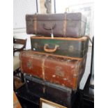 A VINTAGE WOODEN BOUND AND METAL TRAVELLING TRUNK and two vintage suitcases