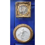 A VICTORIAN STYLE MARBLE RESIN FRAMED PLAQUE with carved decoration of an angel and another