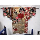 A LARGE HANGING ORIENTAL PANEL in the form of a kimono