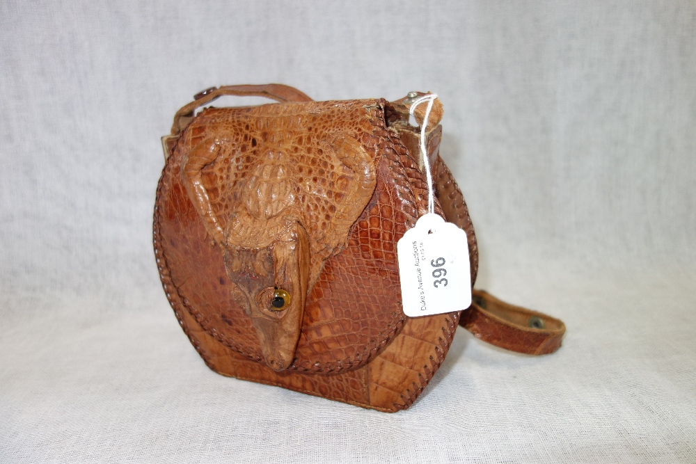 A LIZARD SKIN SHOULDER BAG, with head and feet