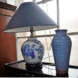 A CHINESE BLUE AND WHITE VASE converted into a table lamp and a blue glazed vase