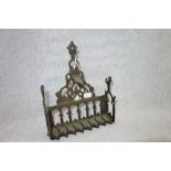 A CAST BRASS JEWISH HANGING HANUKKA MENORAH, 22 cm high