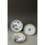 THREE JAPANESE ARITA BLUE AND WHITE CELADON DISHES, two with faux Chinese marks, Edo, 18th