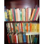 A COLLECTION OF BOOKS, mostly novels, some with dust covers and some Wisden Almanacs