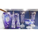 A PAIR OF BOHEMIAN BLUE OVERLAID CUT-GLASS VASES (one with a chip) a large pedestal bowl and similar