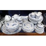 A CHINESE BLUE AND WHITE PART DINNER SERVICE with floral and dragon decoration by Chatsworth