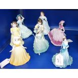 A COLLECTION OF ROYAL DOULTON AND COALPORT FIGURES of women in traditional costume, each 14 cm