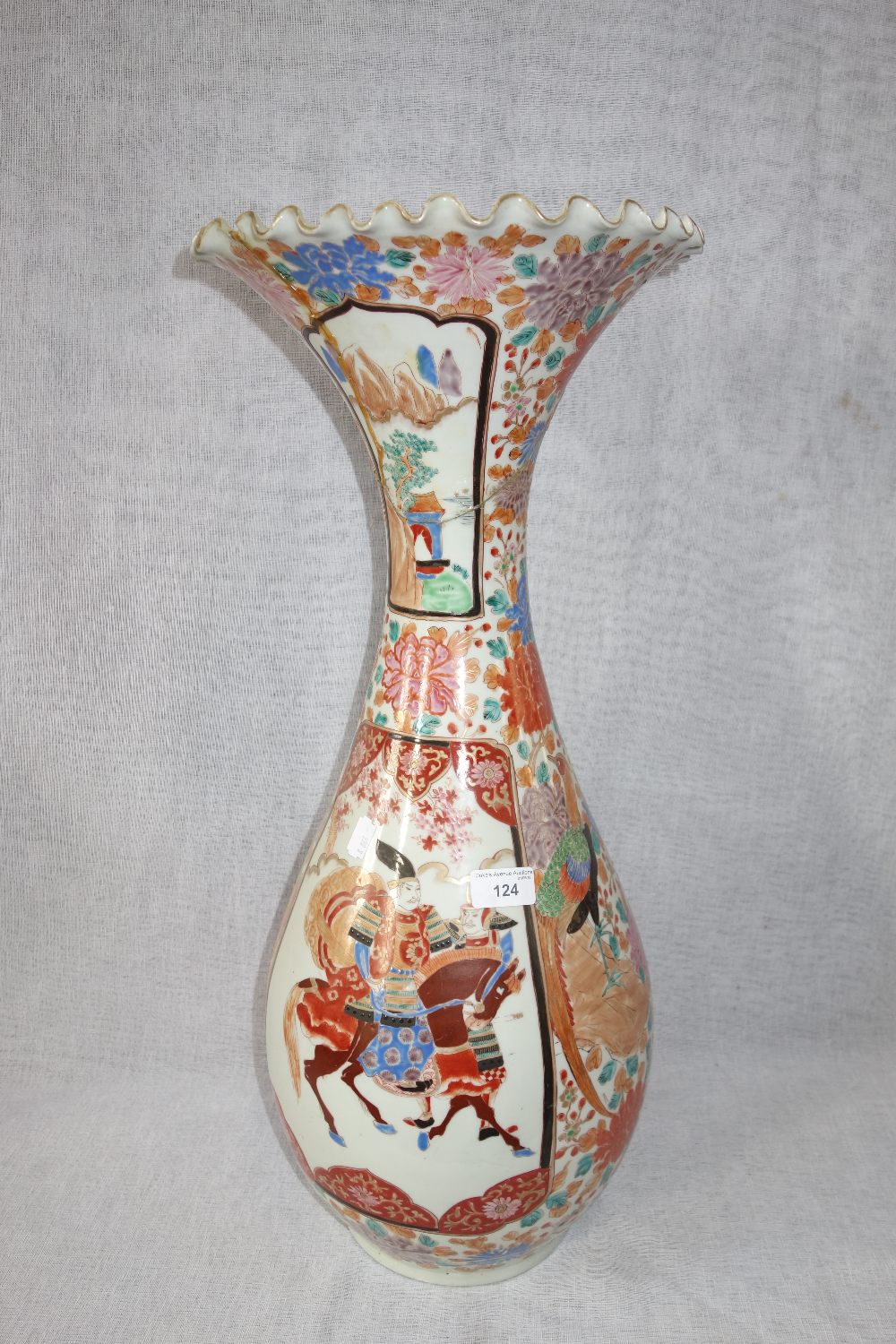 A LARGE ORIENTAL VASE decorated with warriors, birds and foliage (examine) 64 cm high