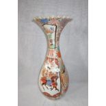 A LARGE ORIENTAL VASE decorated with warriors, birds and foliage (examine) 64 cm high