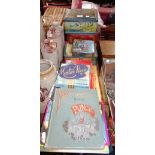 A COLLECTION OF VINTAGE TINS, board games and children's books with annuals