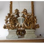 A PAIR OF ROCOCO STYLE DECORATIVE CARVED BRACKETS, 52 cms high