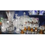 A COLLECTION OF CUT-GLASS VASES, WATER JUGS, GLASSES and similar glassware