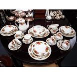 A MAYFAIR FINE BONE CHINA PART DINNER SERVICE with floral decoration