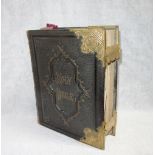 A VICTORIAN FAMILY BIBLE with brass clasps, originally belonging to the Pearce family of Portland,