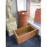 A KINSON POTTERY OF POOLE, TERRACOTTA CHIMNEY POT and a terracotta plant trough