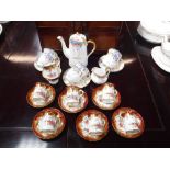 A WOODLANDS CHINA COFFEE SET comprising five tea cups and saucers, coffee pot, cream jug and similar