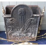 A REGENCY STYLE CAST-IRON FIRE-BACK with Prince-of-Wales feathers decoration, 53 cms high x 43 cms