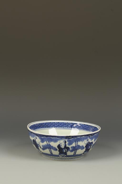 A JAPANESE ARITA BLUE AND WHITE CELADON BOWL , the exterior with five scholars in a landscape,