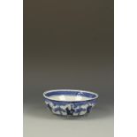 A JAPANESE ARITA BLUE AND WHITE CELADON BOWL , the exterior with five scholars in a landscape,