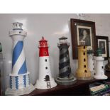 A COLLECTION OF SIX TIN MODELS OF LIGHTHOUSES