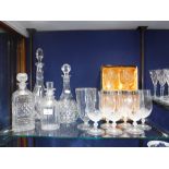 A SET OF SIX MODERN WINE GLASSES, four brandy glasses, a vase and four cut-glass decanters